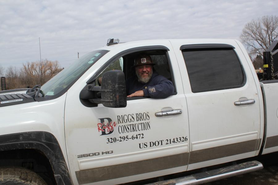 Dave Reigstad, owner of Riggs Brothers Concrete in Kandiyohi, Minn., with his signature hard hat leaves the open house with a smile on his face.
