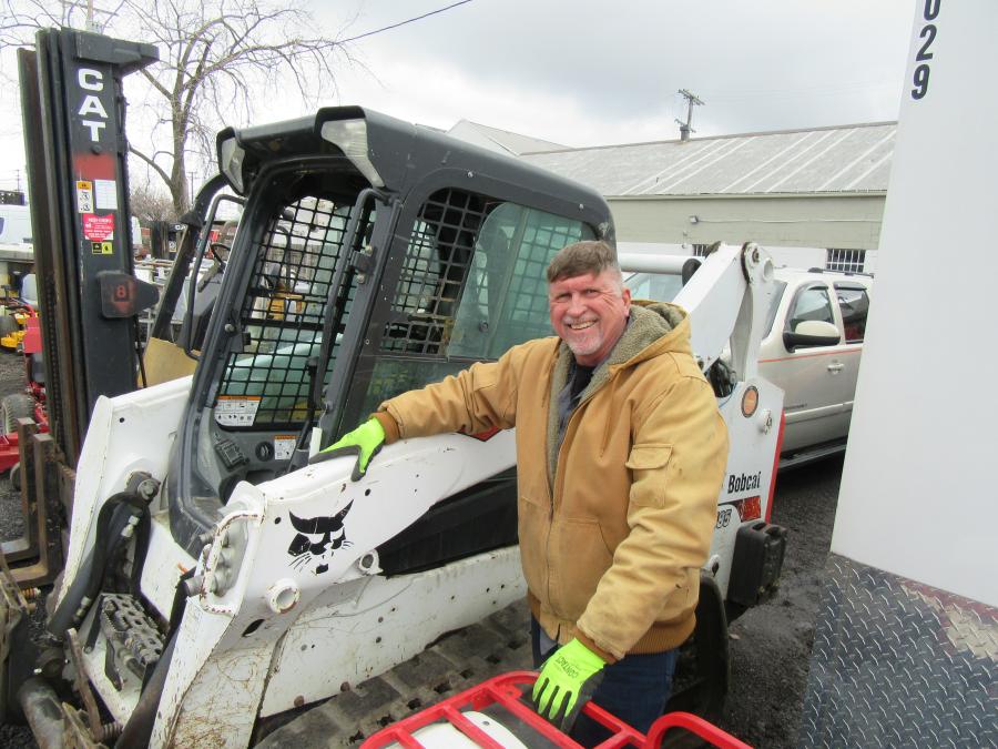 Rich Brady of Forever Green checks out this Bobcat T595 compact track loader.