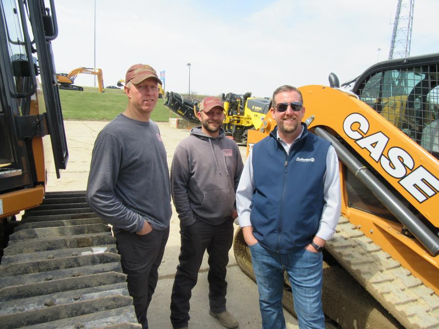 (L-R): Bud Raber and Michael Angle of Fryburg Excavating and Trucking were joined by Nick Ames, Southeastern Equipment sales representative, at the North Canton open house.
