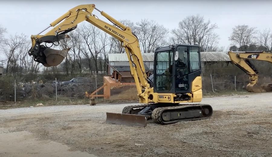 A 2016 New Holland mini-excavator E55BX was on the auction block at Compass’ February sale.
