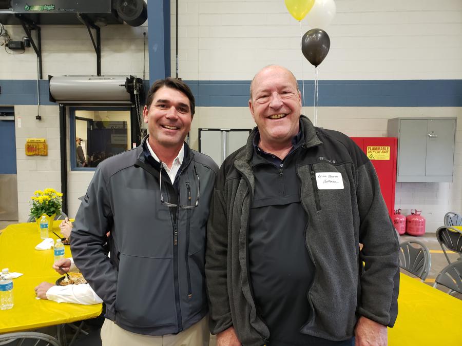 Todd Stanley (L), chief operations officer of Fabick Cat, and Brian Burns, equipment fleet manager of Hoffman Construction, talked shop.
