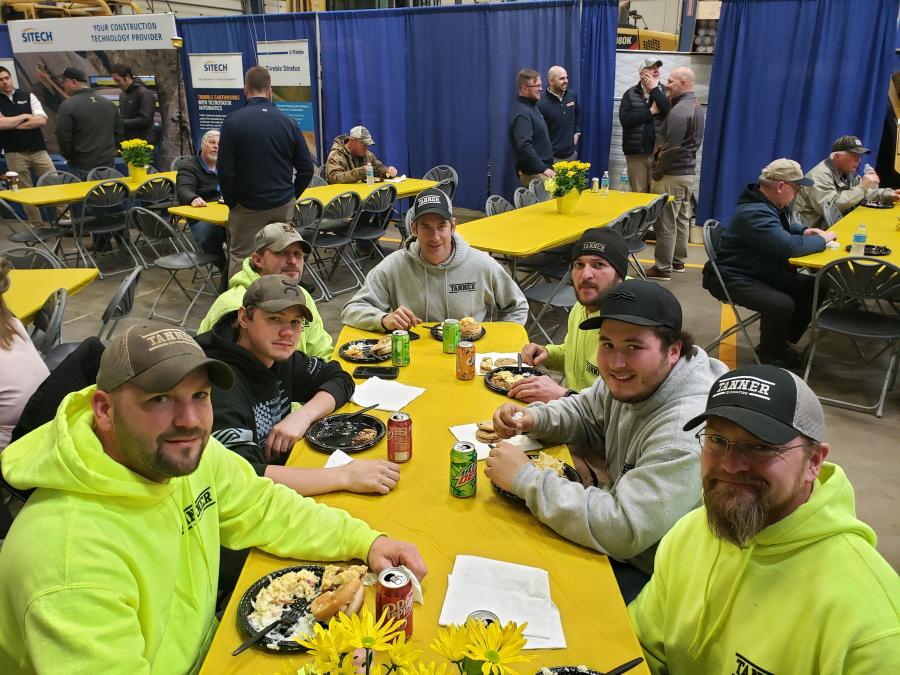 The Tanner Excavating crew of Altoona, Wis., are enjoying lunch.
