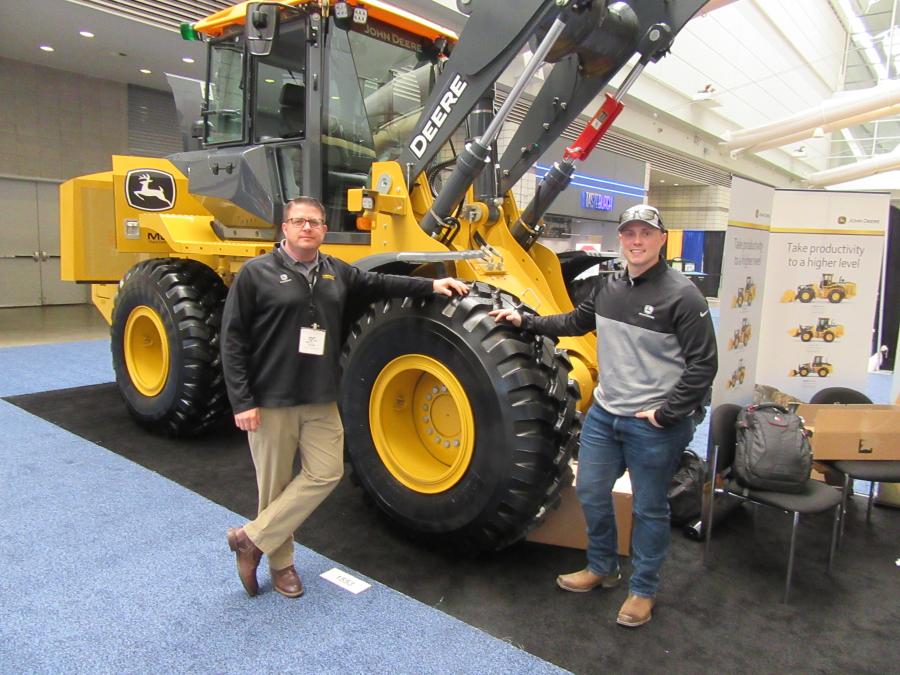 Murphy Tractor and Equipment’s Chris Grimes (L) and Adam Kelley brought this John Deere 544 wheel loader to the Snow Conference.
