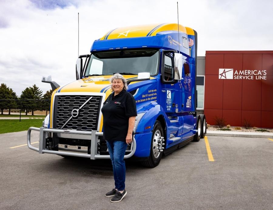 Carmen Anderson, America’s Service Line professional driver, and the Volvo VNL760 that she’ll now be operating to help raise awareness and support of Special Olympics. (Jenn Koss photo)
