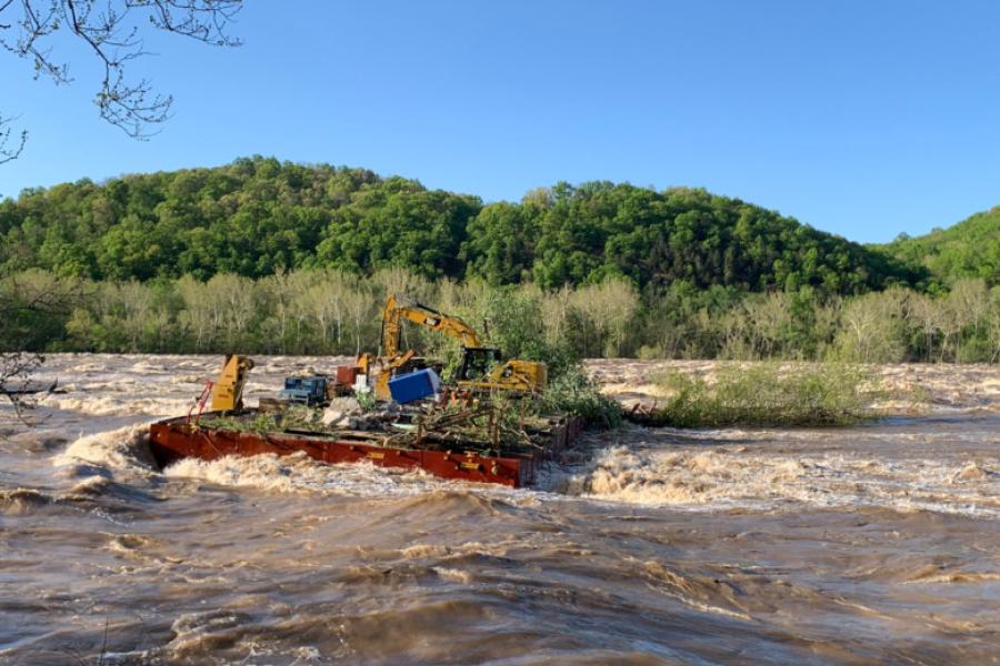 A barge carrying construction equipment was seen floating in the high water of the Potomac River in West Virginia. (Loudoun County Sheriff's Office photo)
