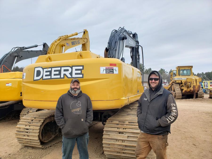 Carl Stoflet (L) of Stoflet Logging and Jarrod Barton of Seneca Industrial Welding are pictured with a John Deere 270D LC excavator.
(CEG photo)