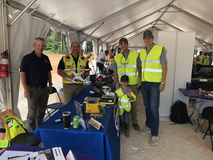 The team at SITECH Horizon understands how to apply Trimble technology to effectively solve some of the biggest challenges contractors face on the construction site. (L-R): Jeff Hasenmayer and Tracy Skipper of SITECH go over the drone options with Tyler, Streeter and Harris Lecka of Wildlands Construction in Charlotte, N.C.
(CEG photo)