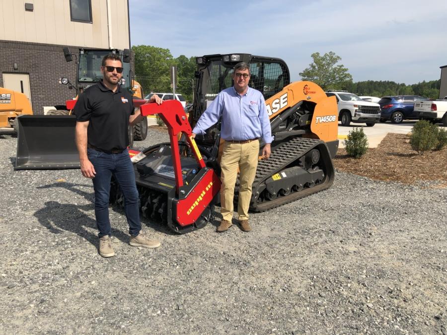 Zach Cooper (L) of Cooper Construction in Flat Rock, N.C., and Jim Hills are shown with the Case TV450B with a Seppi cutter head. Cooper Construction built the new Hills Machinery facility.
(CEG photo)