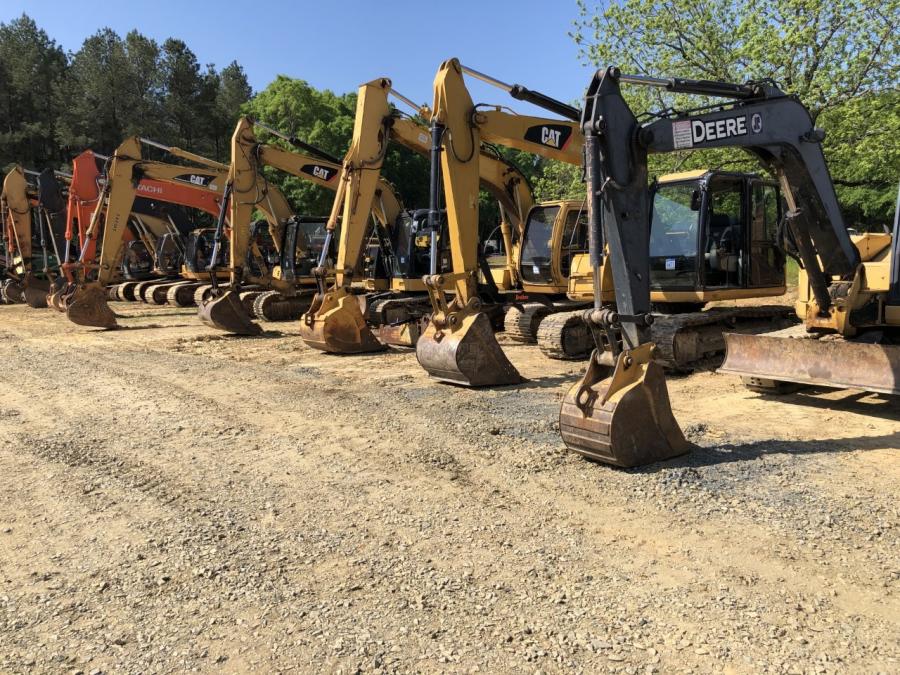 John Deere, Cat, Hitachi and Volvo excavators were ready for the bidders.
(CEG photo)