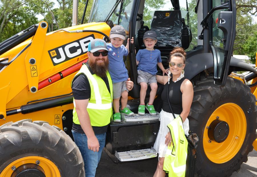 (L-R): It was a nice family outing for lunch and a show of JCB machines for the Baker family — Michael, two-year-old twins Wesson and Maverick, and Sara Beth Baker of Baker Construction, Ocala, Fla. 
(CEG photo)