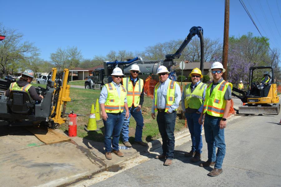 (L-R): Chris Reinmiller, president, Superior Pipeline Services; Kody Griffin, truck vac sales representative,Vermeer Texas-Louisiana; Cory Kelsey, vice president of operations, Superior Pipeline Services; Champ Cox, Vermeer Texas-Louisiana sales manager; and John Fiddler, sales representative of Vermeer Texas-Louisiana, oversee a job site in Everman, Texas. Inset: A Superior Pipeline Service Vermeer VXT600 truck vac performs a “soft dig” to expose existing utility lines, allowing a traditional excavator to operate more safely.
(Superior Pipeline Services photo)