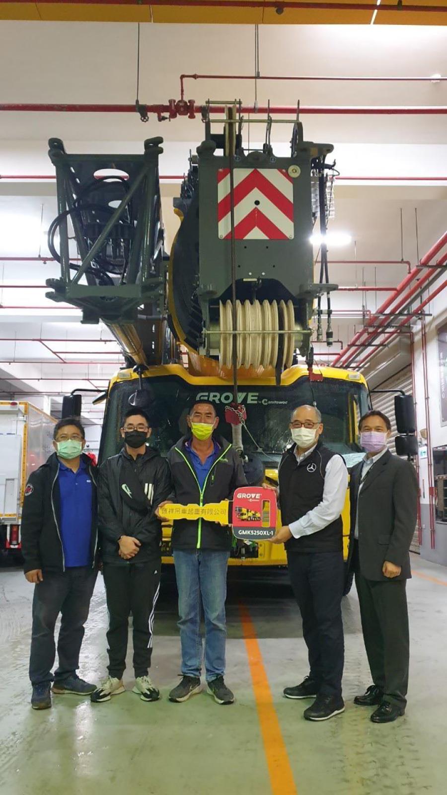 Celebrating the delivery (L-R) are Leon Huang, Champion Auto; Tony Lin, Huixiang Crane Lifting; Lin De Siang, Huixiang Crane Lifting; Terry Lee, Champion Auto; and Henri Lee, Champion Auto.