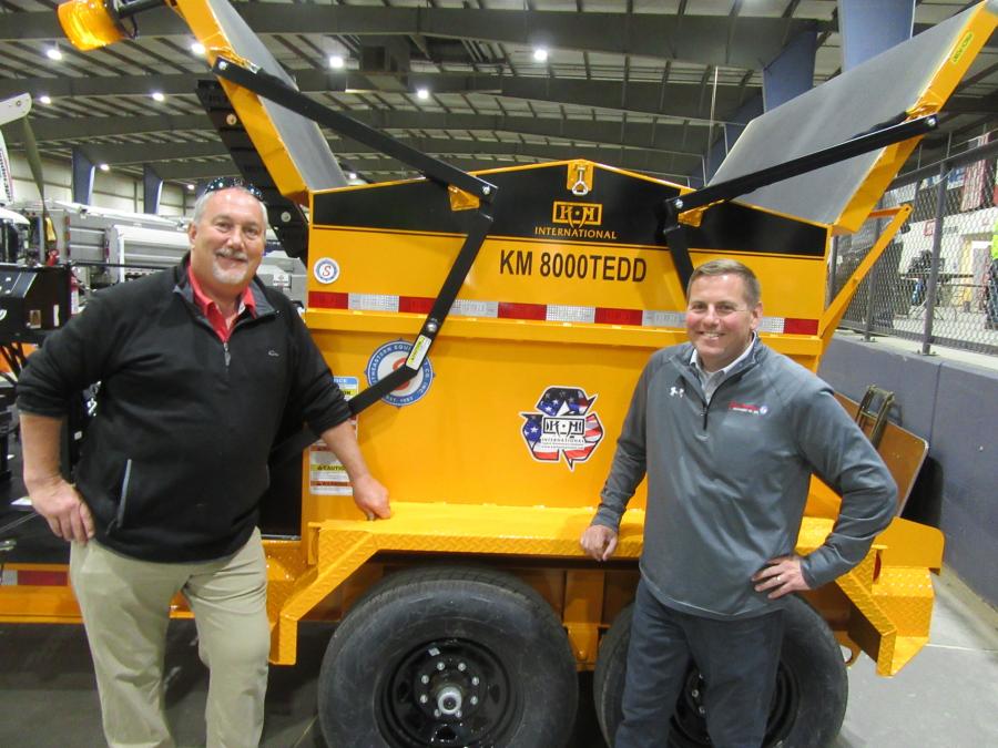 Kurt Schwartz (L), KM International territory manager, joined Mike Kress, Southeastern Equipment Company sales representative, at the Southeastern Equipment Company booth to discuss asphalt maintenance equipment with attendees. 
(CEG photo)