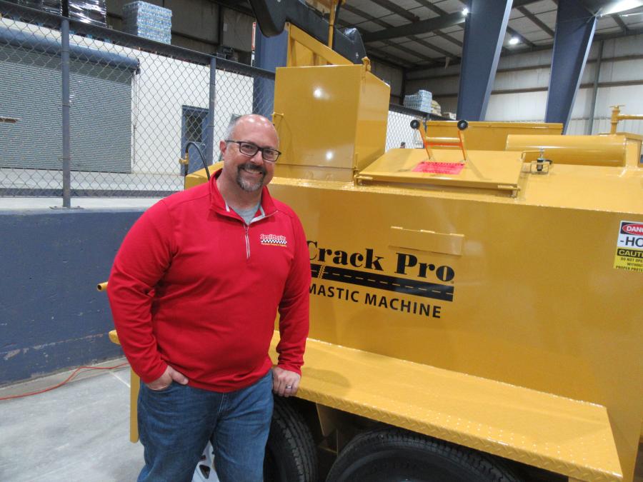 Mike Rich of SealMaster spoke with attendees about the company’s pavement products and equipment at the show. 
(CEG photo)