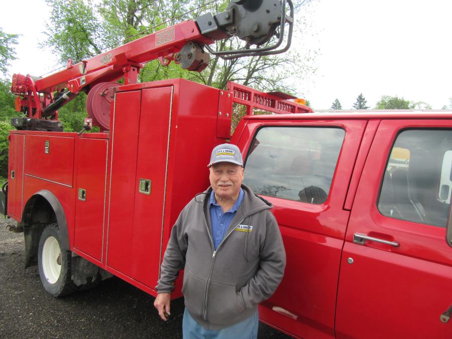 Lloyd Pant of Automatic Septic and Well looks over the service trucks at the auction.
(CEG photo)
