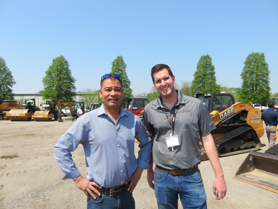 Sam Kukadia (L) of Material Solutions Laboratory spoke with Chris Petges of McCann Industries about one of the Case TV380 skid steers available. 
(CEG photo)