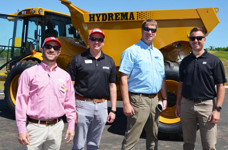 Lots of Yancey vendors turned out, including representatives from Hydrema, whose North American headquarters is based just 4 mi. from this facility. (L-R) are Andrew Harding, Yancey Bros. Co; Mike Byrd, Yancey Entertainment; Barry Ferrell, Hydrema; and Justin Hays, Caterpillar Rental – National Accounts.
(CEG photo)