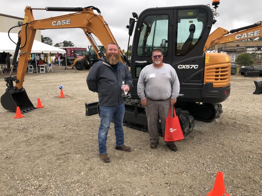 Jimmy Hicklin (L) of Hills Machinery goes over the Case CX57C excavator with Bob Armstrong of A+ Lawn & Landscaping. Armstrong was in the market for a larger machine, so he stopped by to check out the Case products, supported by Hills Machinery.
(CEG photo)