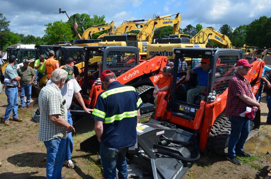 Many onsite registered bidders hovered around a pair of new Kubota SVL 97-2 compact track loaders, awaiting the opportunity to bid on them. 
(CEG photo)