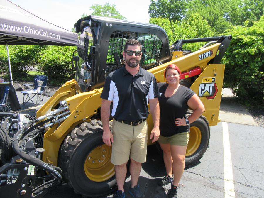 Ohio CAT’s Todd Massaro (L) and Megan Hauser displayed the dealership’s line of Caterpillar equipment geared for municipal maintenance applications.
(CEG photo)