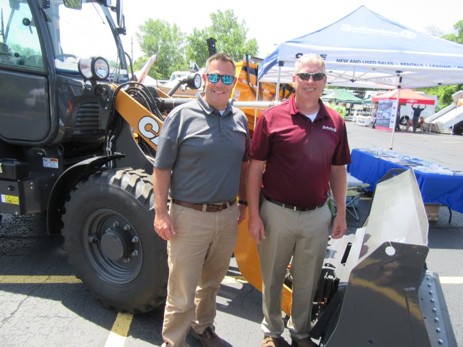 Chris Kurz (L) and David Heath of Southeastern Equipment Company welcome attendees to their outdoor equipment display at the show.
(CEG photo)