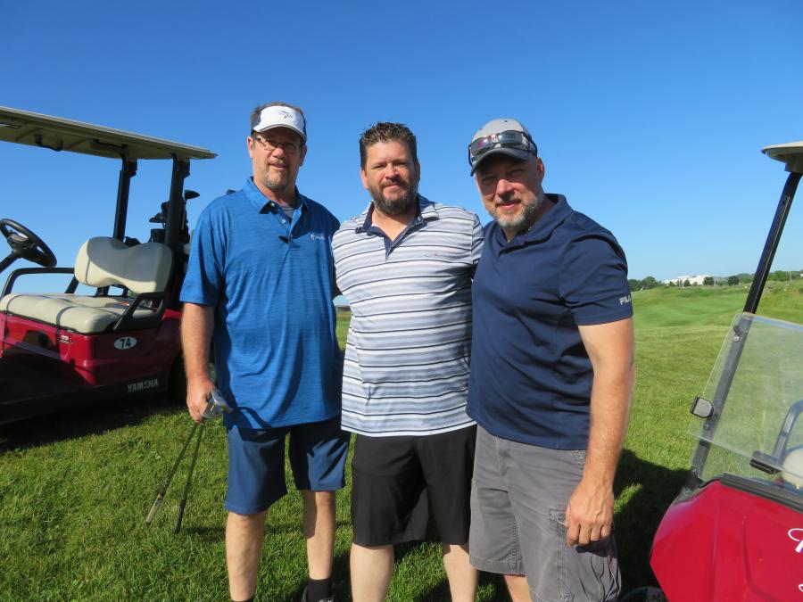 (L-R): Greg Camodeca, Rocky O’Connor and Mark Patla, all of F. H. Paschen Contractors, are enjoying the weather and the outing.
(CEG photo)
