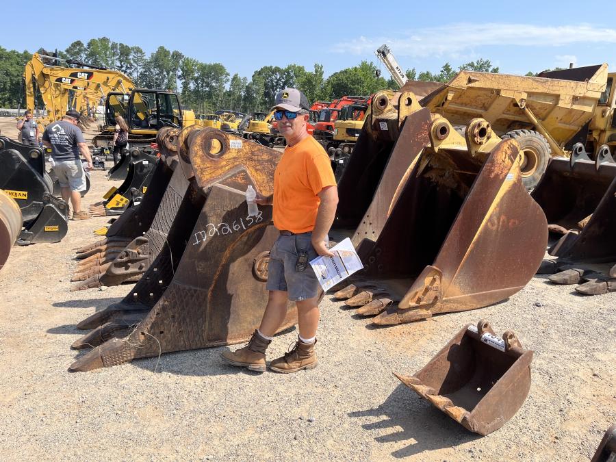 Jarrett Stone of Stone Grading in Starr, S.C., looks over the large and small buckets.
(CEG photo)