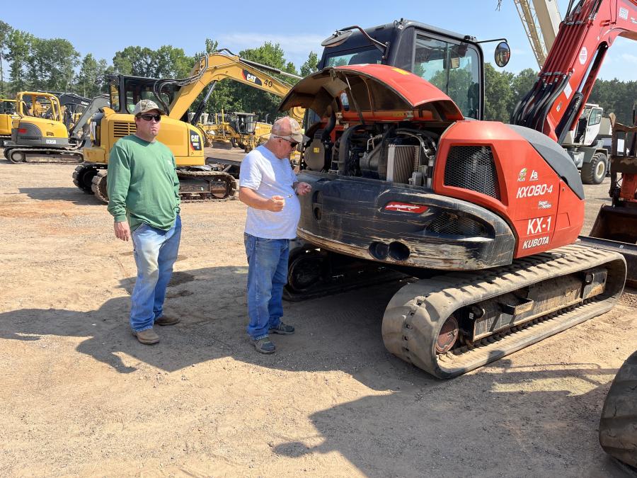 Checking the fluids on the Kubota excavators are Cody and Ronnie Gault of Gault’s Construction in Fountain Inn, S.C.

(CEG photo)