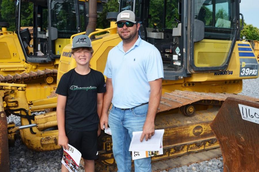 The father-and-son team of Peyton (L) and Kenneth Cook of Cook & Son Construction, Smithville, Miss., check out some of the dozers in the sale lineup.
(CEG photo)