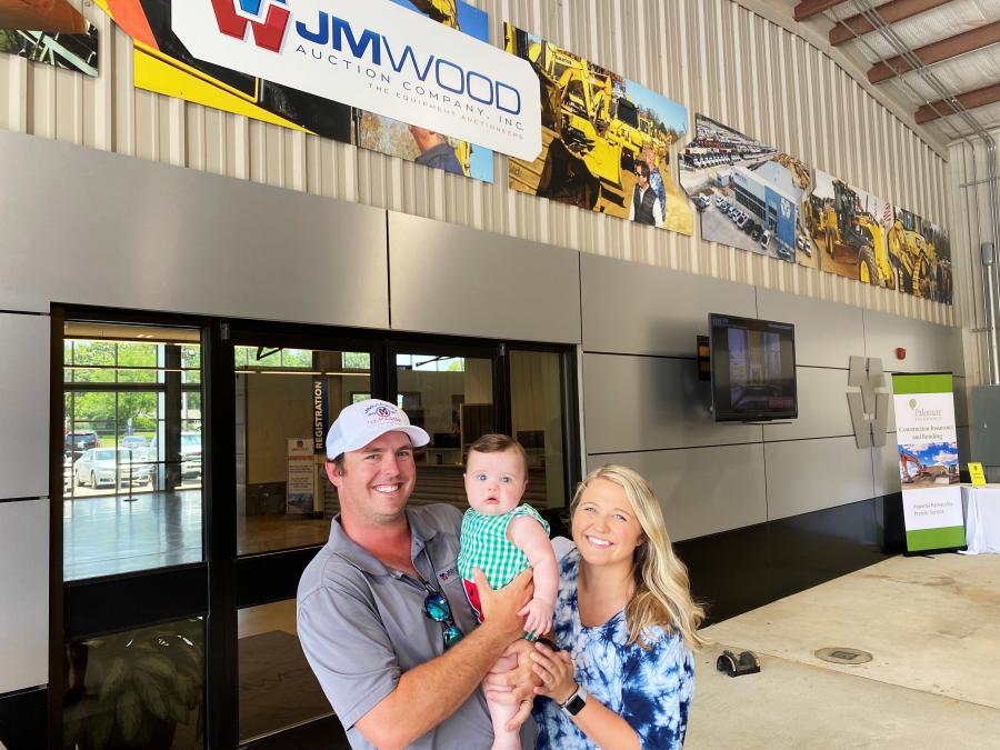 Jeffrey, Emily and young Wheeler Stead enjoy their time at the quarterly auctions. Jeffrey is the JM Wood online inventory manager.  
(CEG photo)