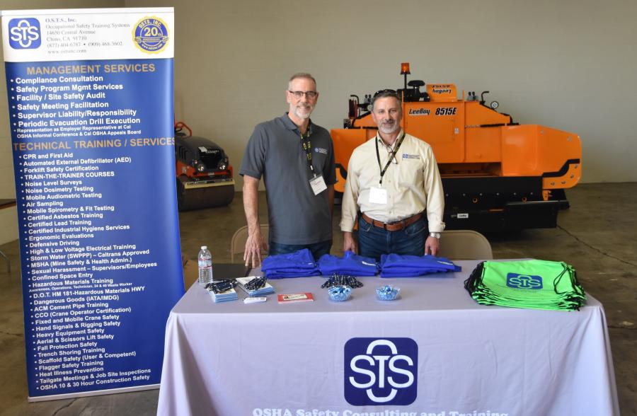 Gregg Bullock (L) and Mike Geosano of OSTS Inc. (Occupational Safety Training Systems) discuss OSHA requirements and training that OSTS can provide.
(CEG photo)