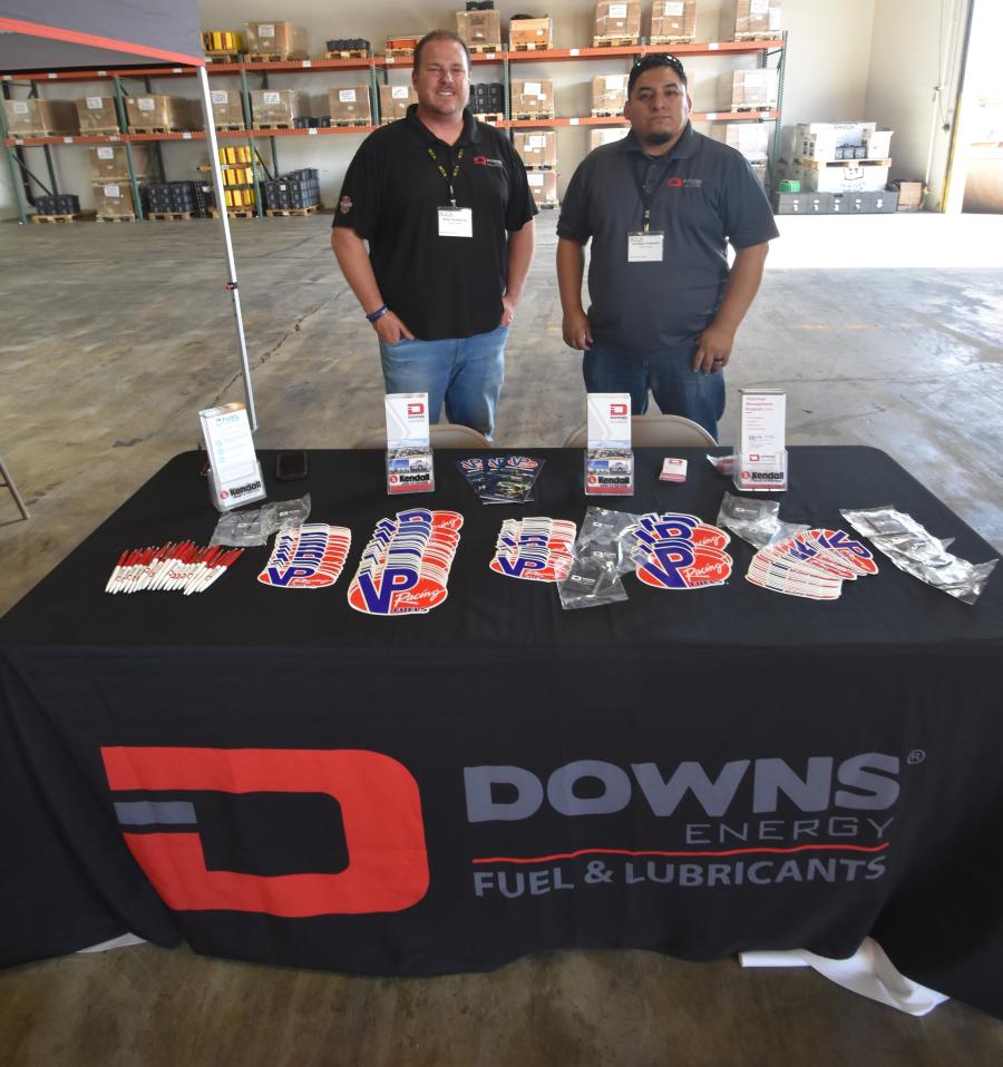 Downs Energy’s Brian Henderson (L) and Jonathan Francisco talk about ways to “fuel your business.”
(CEG photo)