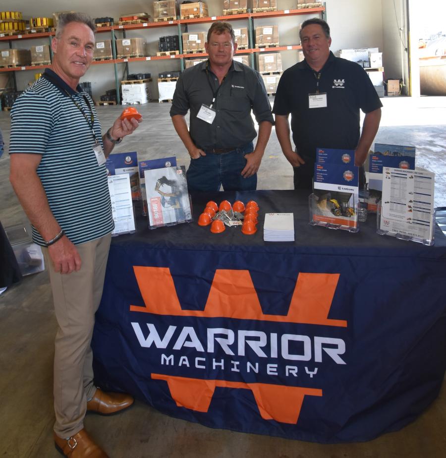 Warrior Machinery representatives John Blitz (C) and Mickey Kolitz (R) talking about LiuGong with Craig Fish of Marina Landscape, one of California’s largest independent landscape construction firms.
(CEG photo)