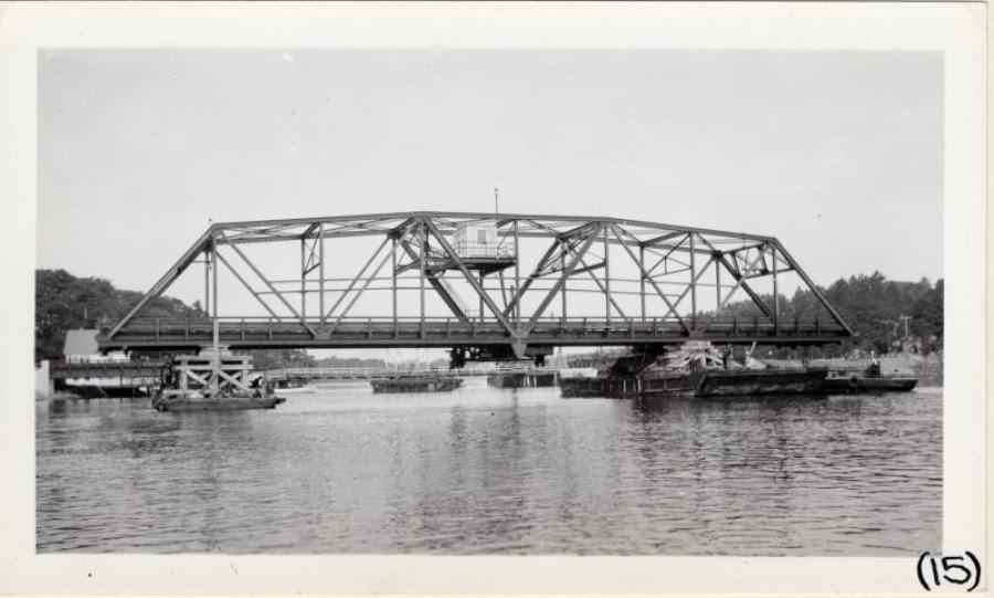 The Southport Bridge opens by swinging its middle section to the side to let boats pass through. (Photo courtesy of MDOT historic bridge archives)
