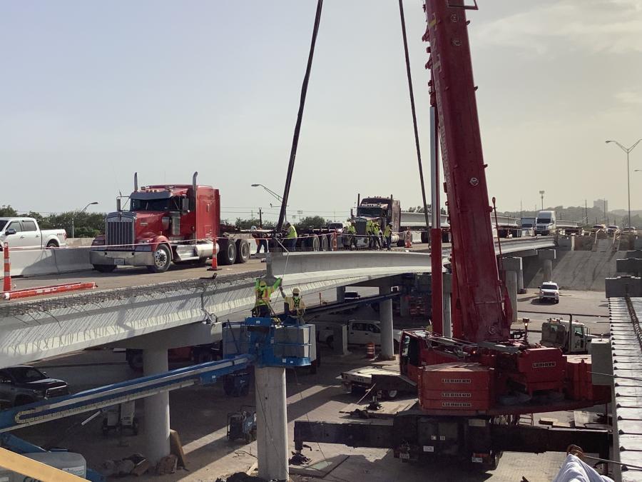 Oak Hill Parkway workers install the first bridge beams for the project along U.S. 290 at Old Fredericksburg Road. This is one of several existing bridge widenings taking place east of the U.S. 290/
SH 71 Y interchange.
(Colorado River Constructors photo)