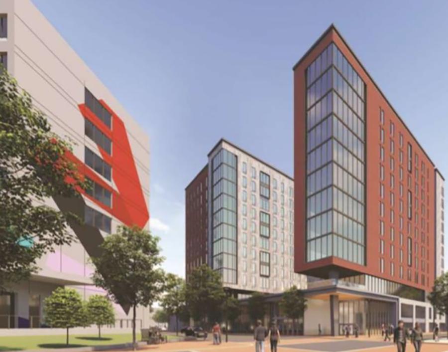 A rendering of a new residential hall VCU plans to build on Grace Street. To the left is the existing honors dorm. (Image courtesy of VCU)