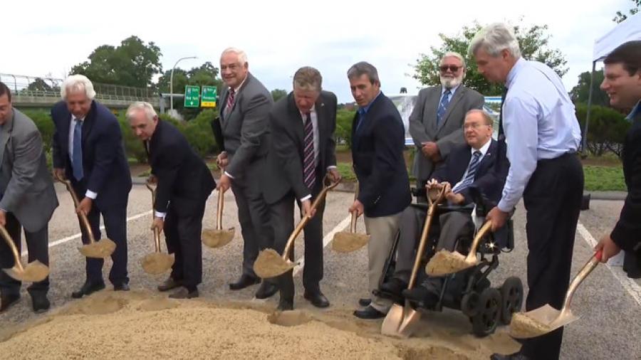 City, state and federal dignitaries participate in a ceremonial ground-breaking for the Airport Connector project in Warwick, July 18, 2022. (Photo courtesy of WJAR)