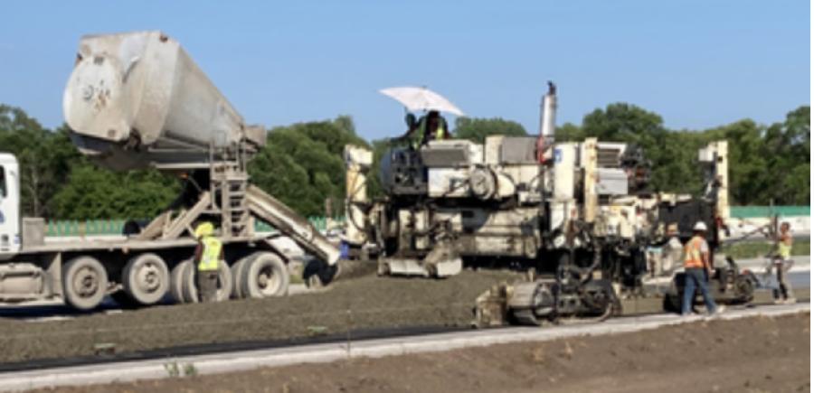 Concrete must remain under 90 degrees when delivered to the work site for paving. This requires the use of cold water in the mixing process in summer and warm water in the cooler months when temperatures dip below freezing.
(Andrew Borders, MnDOT field inspector photo)