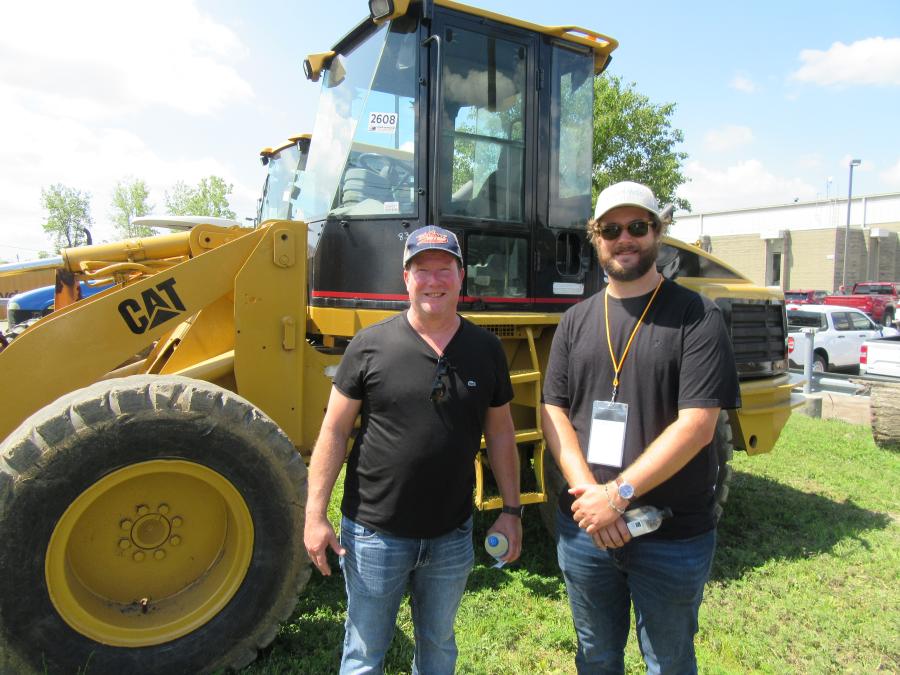 Masser Metals/Ohio Drop Off’s Chris Weber (L) and his son, Christopher, landed a roll-off container, forklifts and a fuel tank.
(CEG photo)