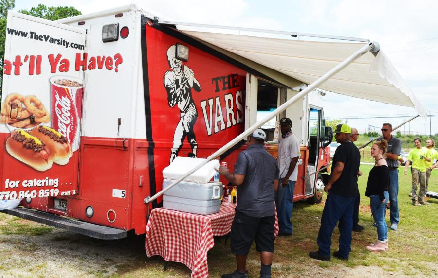 The Varsity catering rolled in and served its signature menu of stadium and tailgating style food — and as they say it “What’ll ya have?”  (CEG photo)