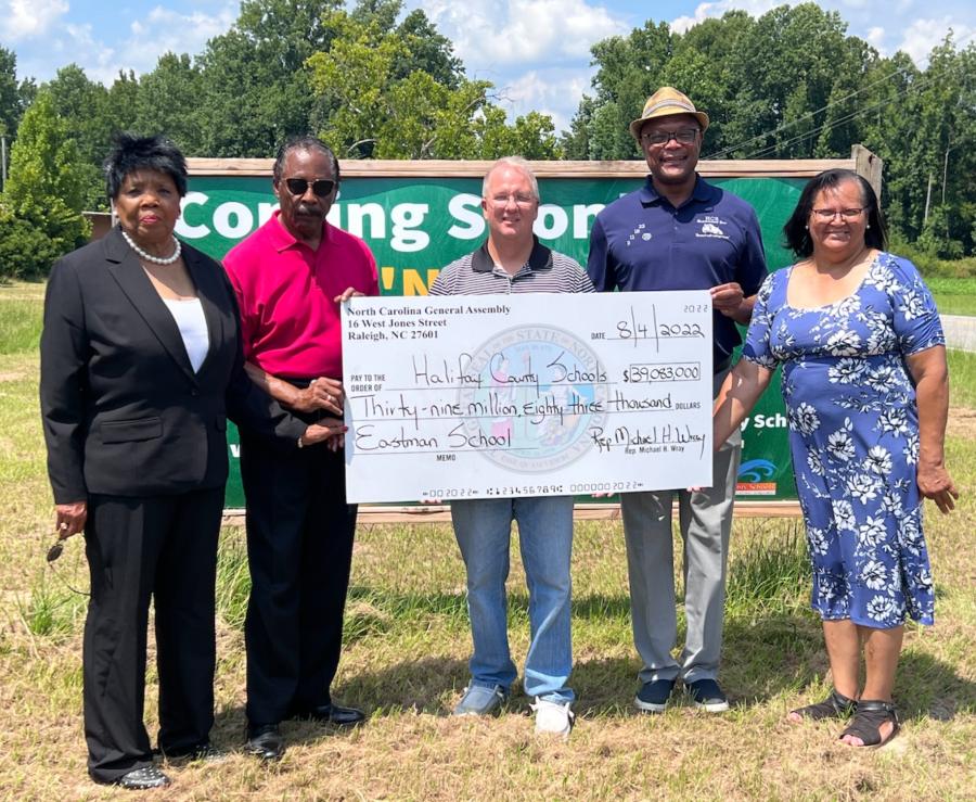 State Representative Michael Wray presented Halifax County Schools a $39,083,000 check which will be applied to building a new Eastman School in the western part of the county. (Photo courtesy of RRSpin.com)