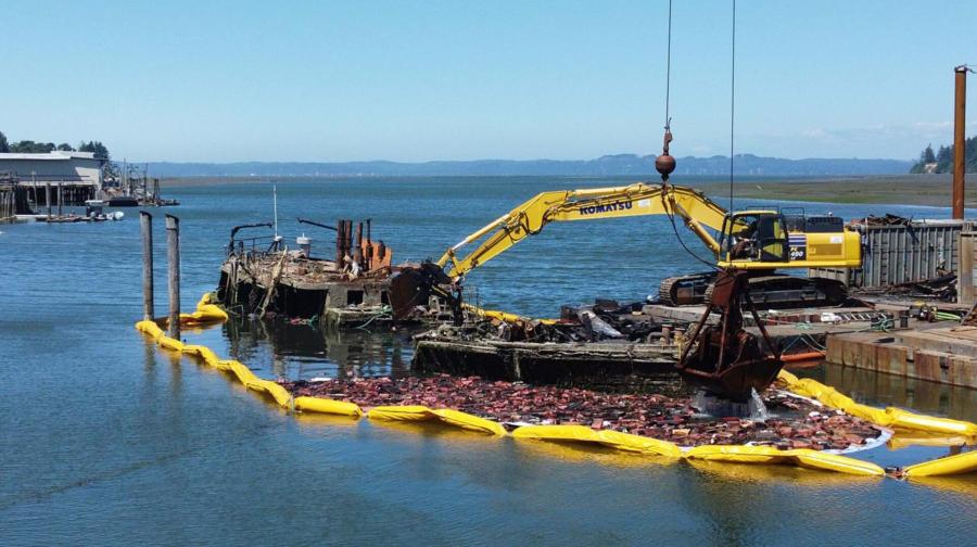 Crews from Ballard Marine Construction have been working on the wreckage from research vessel Hero in Bay Center, Wash., for about a month, removing hazardous chemicals to pick it apart piece by piece. A massive crane and excavators on a barge have done most of the work.
(Chnook Observer photo)