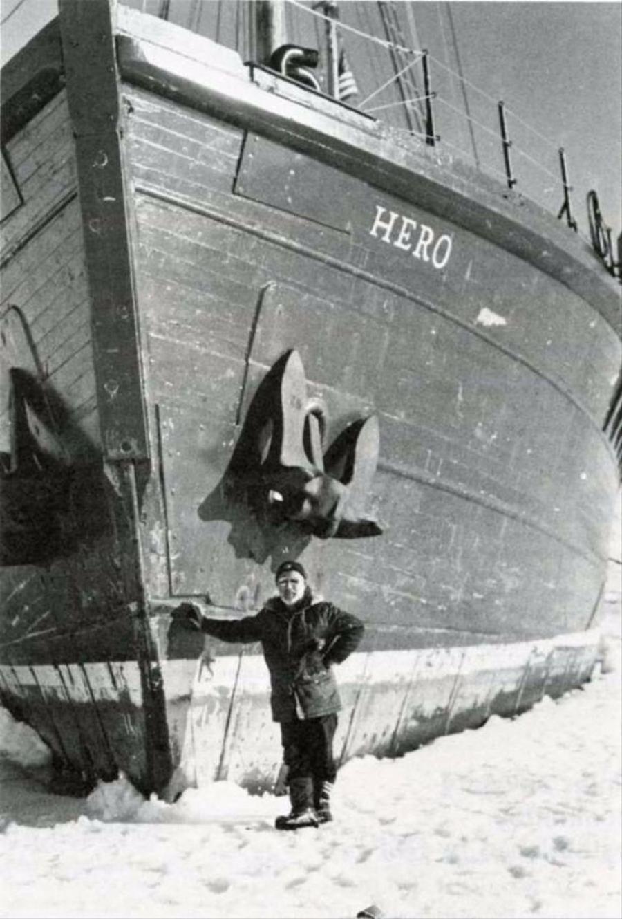 Captain Pieter Lenie poses with the boat in particularly icy conditions in December 1977. (Miguel L. Brand-Wiener, Antarctic Journal. Courtesy of PalmerStation.com)