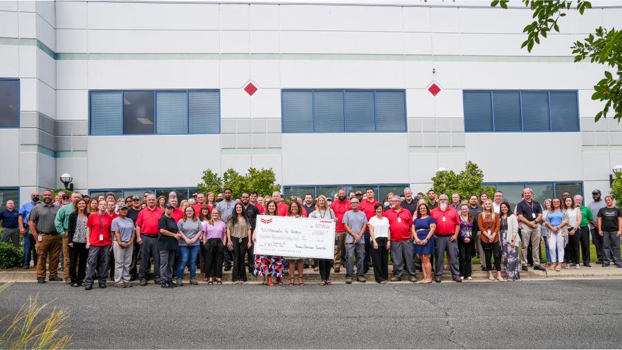 Jeff Albright, president of Yanmar America presented the donation to Rachel Castillo, president and CEO of Advocates for Children at a ceremony at Yanmar’s Adairsville, Ga., headquarters.