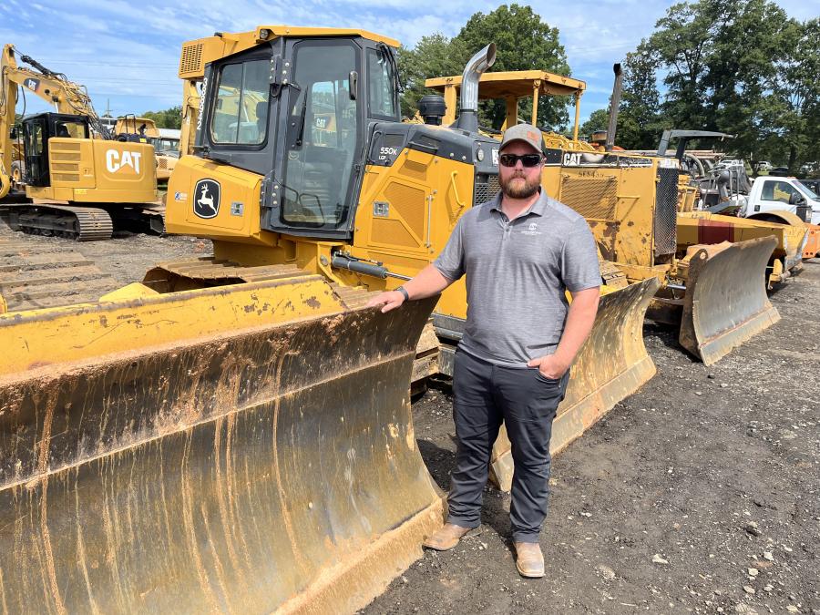 Declan Hopkins of Cornerstone Siteworks in Mooresville, N.C., came to auction with the hopes buying the John Deere 550K dozer. (CEG photo)