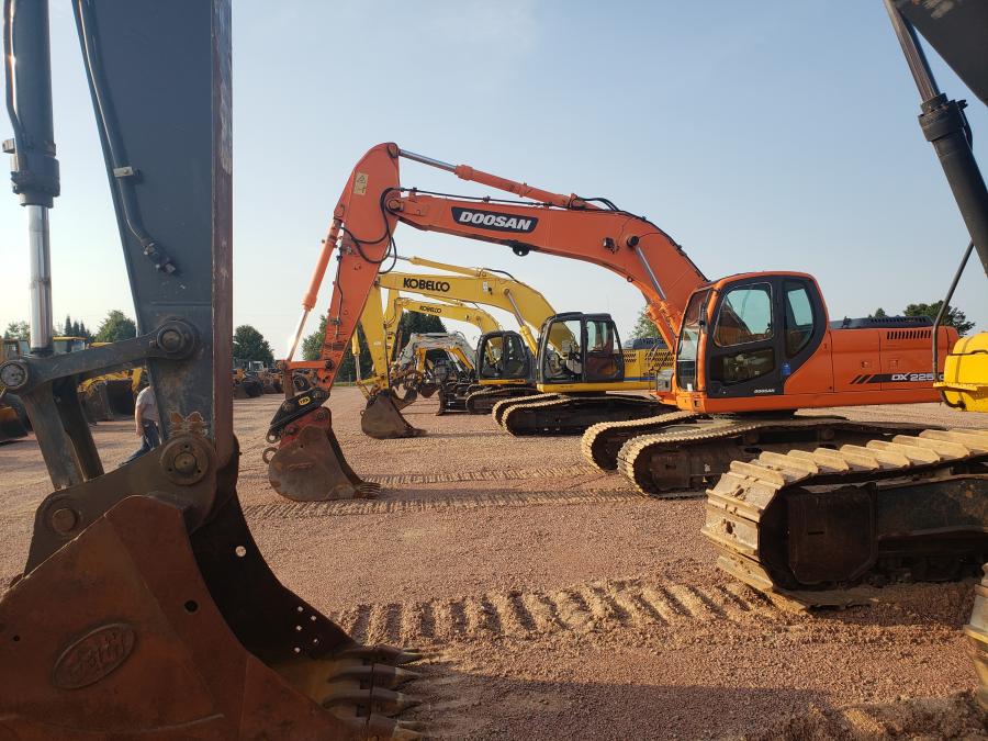 The excavators were lined up for auction goers to look over. (CEG photo)