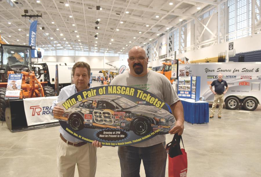 At the 2021 Expo, Kent Hogeboom (L) of Superintendents Profile presented Robert Malone, highway superintendent of the town of Oswego, a pair of tickets to the 2022 NASCAR race weekend at Watkins Glen International Speedway.
(CEG photo)