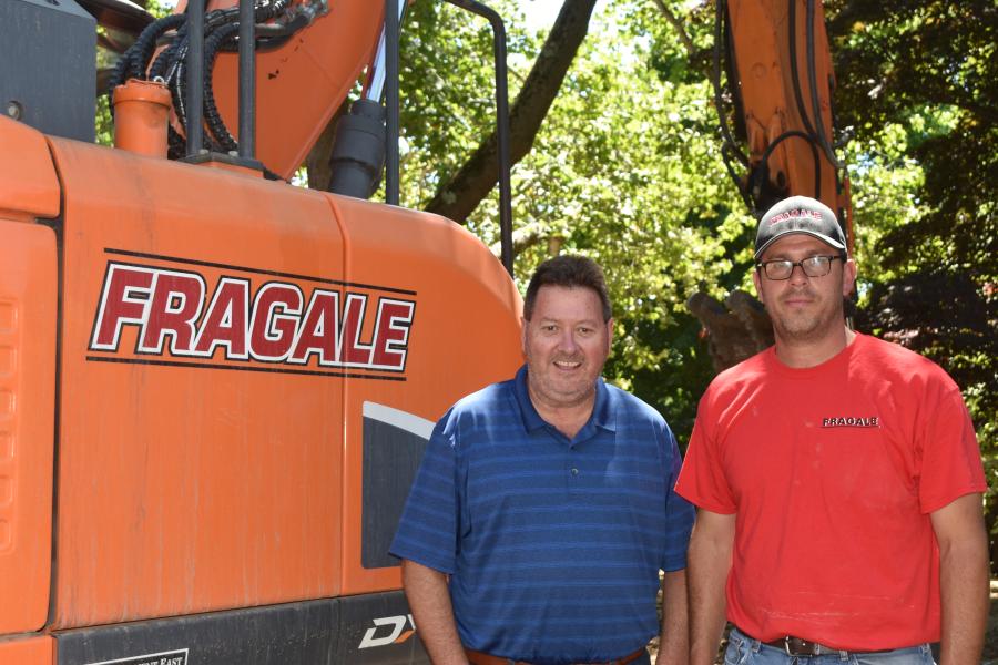 Dan Clifford (L), sales representative of Equipment East, and Carlo Fragale of Fragale Building Corporation.
(CEG photo)