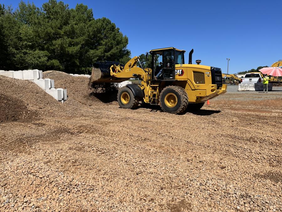 The operator challenge included loading and dumping a precise amount of material using the Cat 938M wheel loader.
(CEG photo)