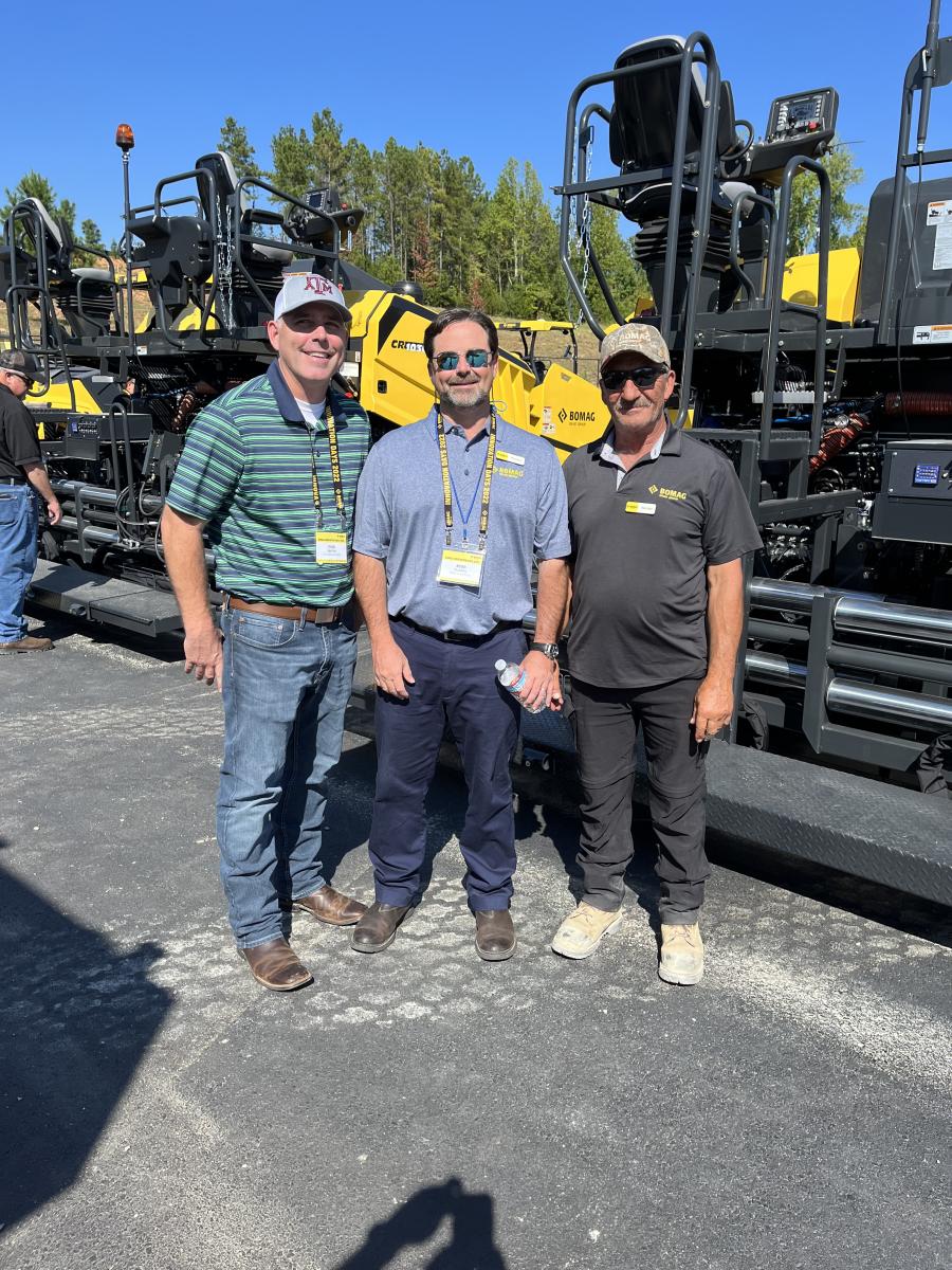 (L-R): Ryan Newton of RB Everett, Pasadena, Texas; Kevin Caldwell, BOMAG, Houston, Texas; and Wayne Gagne, BOMAG product specialist in Canada, stand in front of the new BOMAG CR 1030 paver series featuring dual towers, which increases visibility and operator comfort. (CEG photo) 